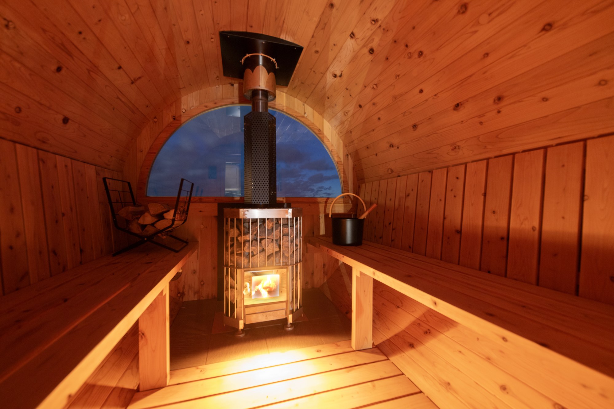 SAUNA — the barrel sauna lit by wood fire